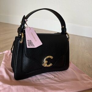 Coccinelle Black Handbag 
(The Italian version of Coach)
*Authentic From Italy*